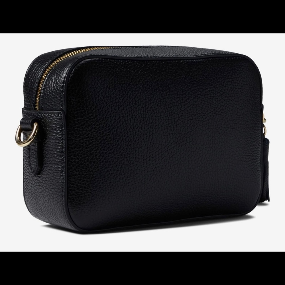 Leather .Zippered closure. Removable shoulder strap.Zippered interior pocket.